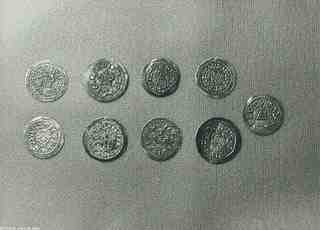 [Lot de 9 monedes localitzades al jaciment d'El Bovalar, anvers]
